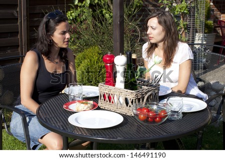 female friends having serious discussion