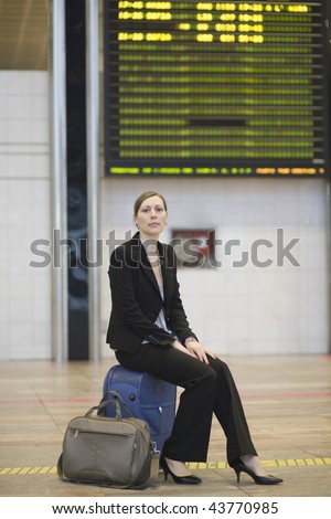Woman waiting at the airport ecause plain is late