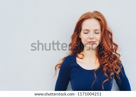 Similar – Image, Stock Photo Happy pretty young redhead woman with a cute smile in a white tshirt with a maple leaf in hands. Golden foliage. Autumnal concept, smiling happy, seasonal moment. Close up portrait