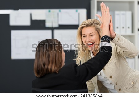 Close up Happy White Businesswoman Showing High Five Sign at the Office.