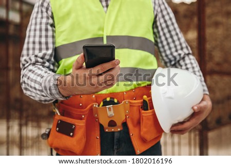 Similar – Image, Stock Photo Faceless male foreman using equipment at workshop