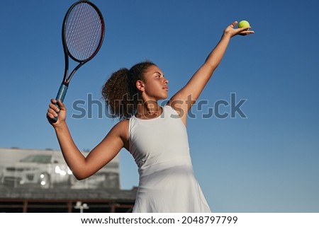 Similar – Image, Stock Photo Young focused ethnic sportswoman on street before training