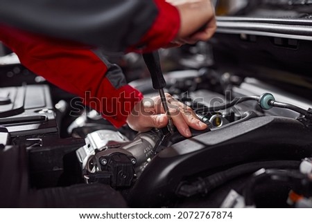 Image, Stock Photo Crop faceless mechanic working with drilling machine in factory