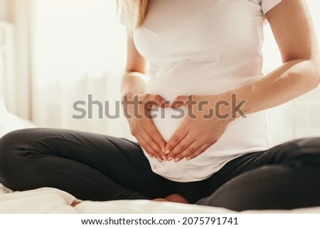 Similar – Image, Stock Photo Anonymous delicate mother sitting on floor with newborn at home