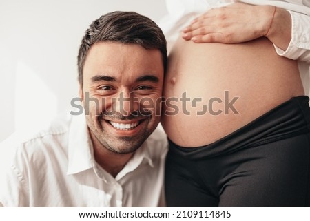 Similar – Image, Stock Photo Anonymous delicate mother sitting on floor with newborn at home