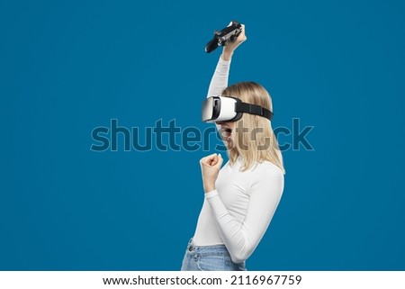 Similar – Image, Stock Photo Cheerful women playing videogame on couch
