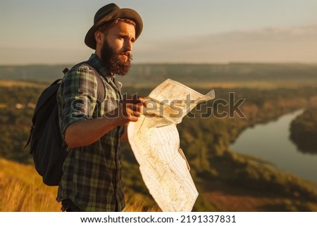 Similar – Image, Stock Photo Serious man admiring mountain in nature