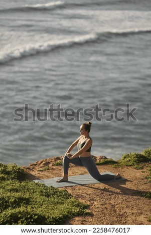 Similar – Image, Stock Photo Rocky cliffs near wavy ocean in sunlight