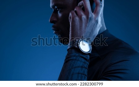 Similar – Image, Stock Photo Ethnic sportsman using tracker on street