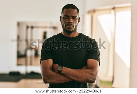 Similar – Image, Stock Photo Ethnic sportsman standing and looking at camera on street