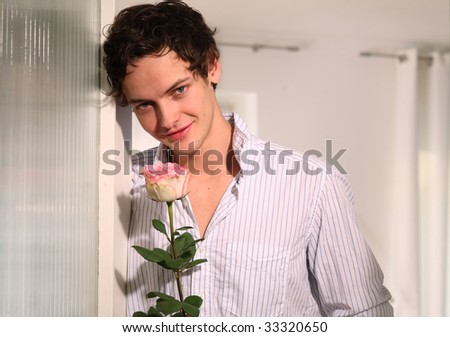 young man with flower