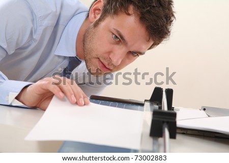 Man cut paper
