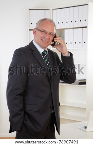 Old Business man at telephone