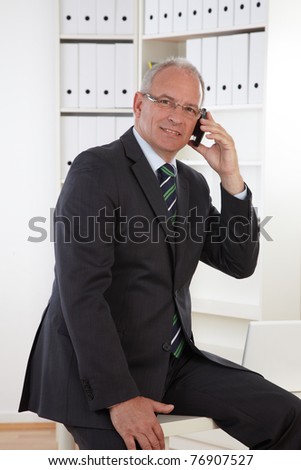 Old Business man at telephone