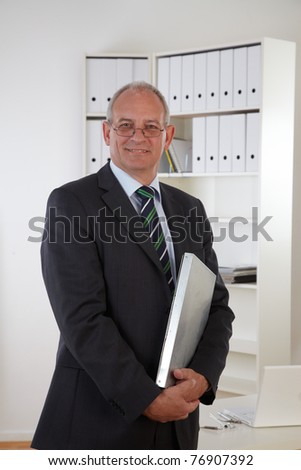 Old business man with clipboard
