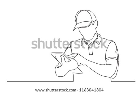 continuous line drawing of standing delivery guy filling order on tablet