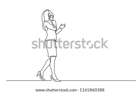 continuous line drawing of walking business woman speaking on mobile phone