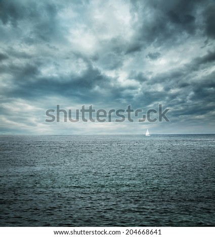 Image, Stock Photo Lonely yacht in gray water with dark mountains under cloudy sky