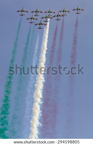 Ostia, Rome / Italy - June 29th 2014: Frecce Tricolori, italian aerobatic Team drawing italian flag with colors smokes at Ostia International Airshow 2014