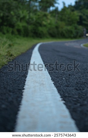 Similar – Image, Stock Photo Winding asphalt road through forest