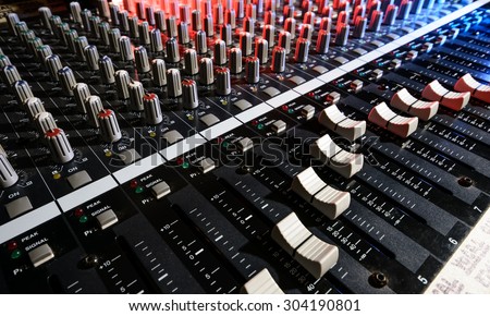detail sound mixer in red, white and blue light with great perspective, the version with great detail controls