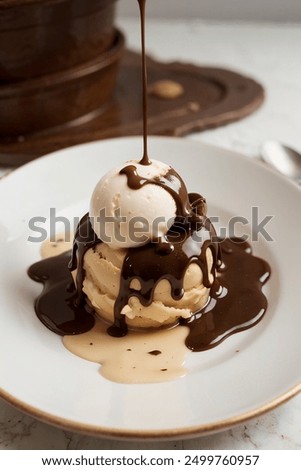 Similar – Image, Stock Photo small vanilla and chocolate muffins illuminated by the morning light ready for breakfast