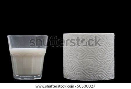Conceptual shot of lactose intolerance, toilet paper and glass of milk
