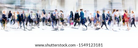 Lots of business people walking in the City of London. Blurred image, wide panoramic view of the road with people at sunny day. London, UK Foto d'archivio © 