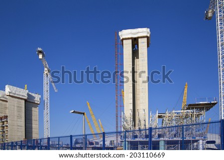 LONDON, UK - MAY 17, 2014: Building site with cranes in centre of London