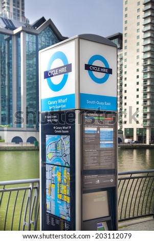 LONDON, UK - MAY 7, 2014: Boris bikes parking in Canary Wharf aria, sponsored by Barkley\'s bank. Popular city transport among Londoners