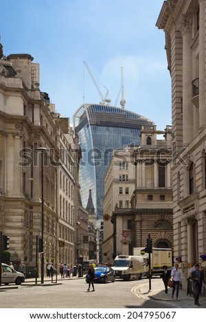 LONDON, UK - JULY 03, 2014: Big building site in the Bank of England aria. Erasing new office and apartment buildings