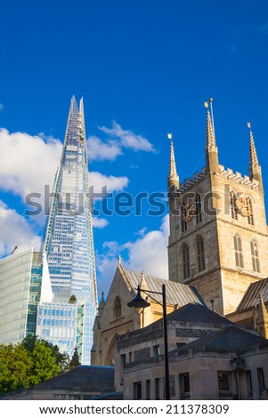 LONDON, UK - AUGUST 9, 2014 Shard of glass, opened to the public on February 2013 309 m, the tallest building in Europe South bank walk of the river Thames