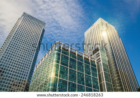 LONDON, UK - JULY 3, 2014: Canary Wharf skyscrapers against blue sky