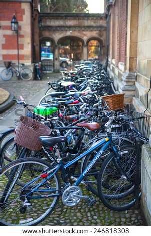 CAMBRIDGE, UK - JANUARY 18, 2015: Students' bikes in Pembroke college, university of Cambridge. The inner courtyard