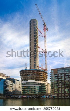 LONDON, UK - NOVEMBER 29, 2014: Building site on in the Canary Wharf. 46 floors residence tower going to be the tallest resident unit in London