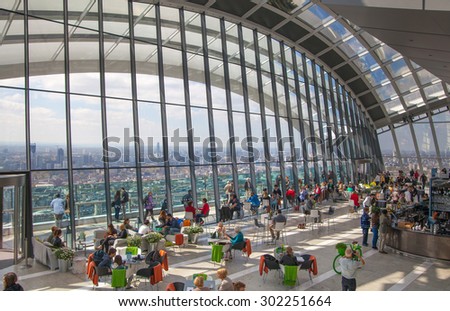 LONDON, UK - APRIL 22, 2015: People in the restaurant of the Sky Garden Walkie-Talkie building. Viewing platform is highest UK garden, locates at the 32 floor and offers amazing view of London