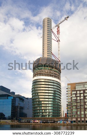 LONDON, UK - May 21, 2015: One of the tallest apartment buildings in London in construction progress