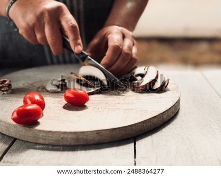 Similar – Image, Stock Photo Crop woman cutting mushroom over bowl