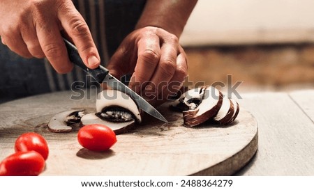 Similar – Image, Stock Photo Crop woman cutting mushroom over bowl