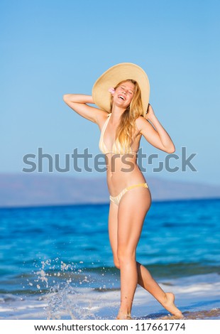 Beautiful Young Woman on Tropical Beach in Hawaii