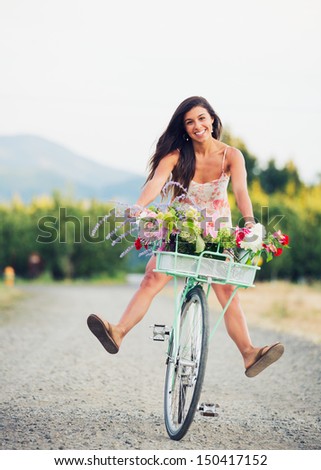 Beautiful Young Woman on Bike in Countryside, Summer Lifestyle