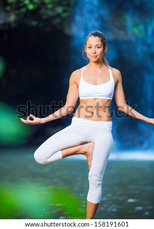 Beautiful Woman Practacing Yoga in Nature, Beautiful Natural Waterfall