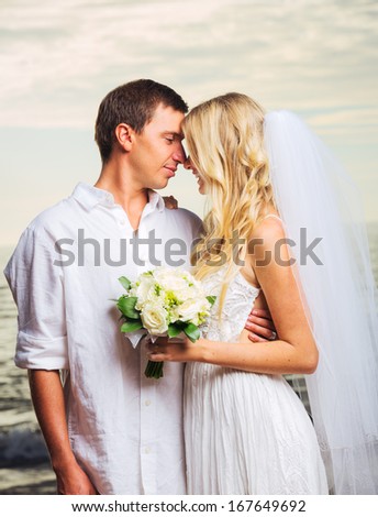 Bride and Groom, Romantic Newly Married Couple Kissing at the Beach, Just Married