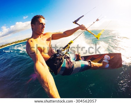 Kiteboarding. Fun in the ocean, Extreme Sport Kitesurfing. POV Angle with Action Camera