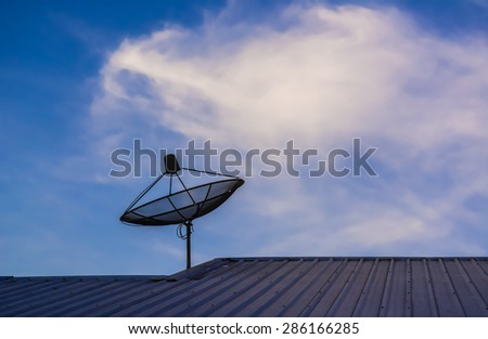 satellite TV receiver mounted on the roof.