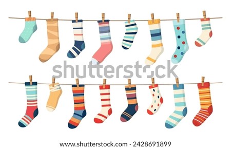 Socks on clothesline, cotton or wool socks hanging on rope with clothespins, cartoon vector. Socks laundry on line with pins, socks with color ornament pattern hanging on clothesline for kids design