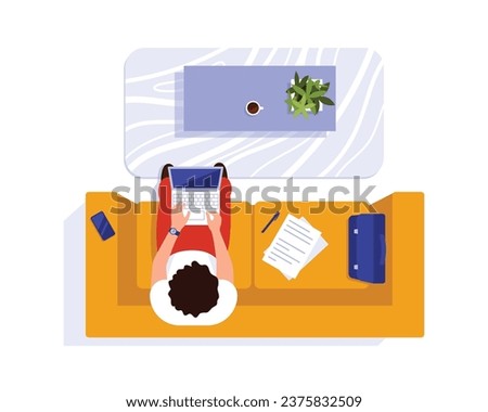 Vector illustration of a top view of a guy working on a laptop. Cartoon scene with a guy sitting on a sofa with a laptop, papers, a briefcase, a smartphone and a table with a cup and a flower pot.