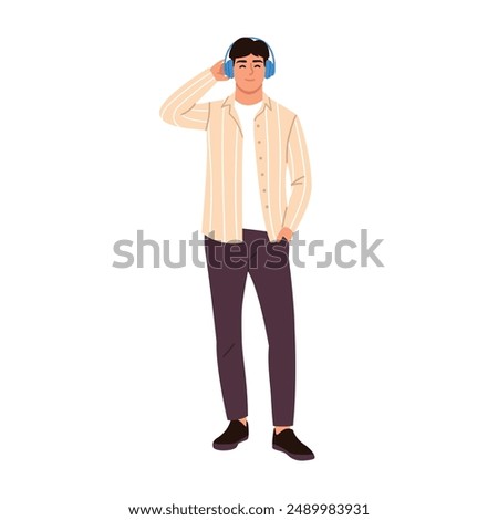 Vector illustration of a guy listening to music in blue headphones. Cartoon scene of a stylish guy in headphones, dressed in brown pants, a shirt and a white t-shirt isolated on a white background.