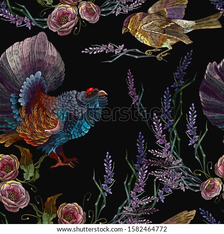 Wood grouse, titmouse birds, lavender and roses flowers. Embroidery seamless pattern. Spring forest art. Fashion template for clothes 