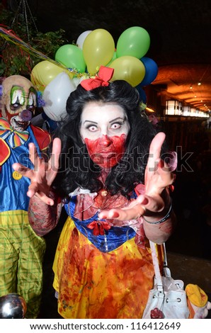 LONDON - OCTOBER 13: Unidentified woman dresses as zombie celebrates World Zombie Day London 2012 on October 13, 2012 in London, England.